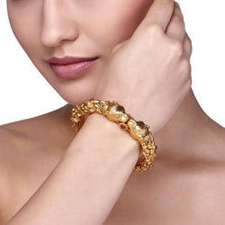 STUDDED RUBY LION BANGLE